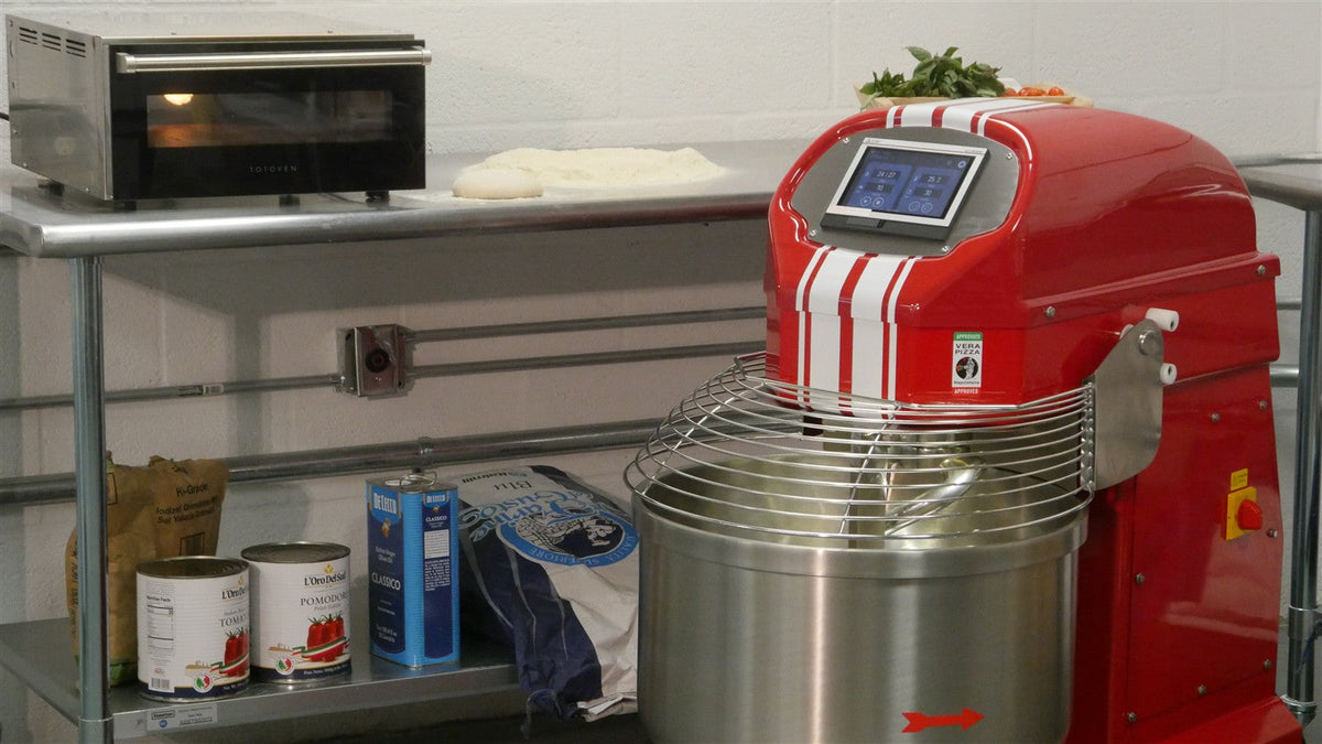 Sunmix QUEEN industrial spiral mixer installed in a working pizzeria kitchen