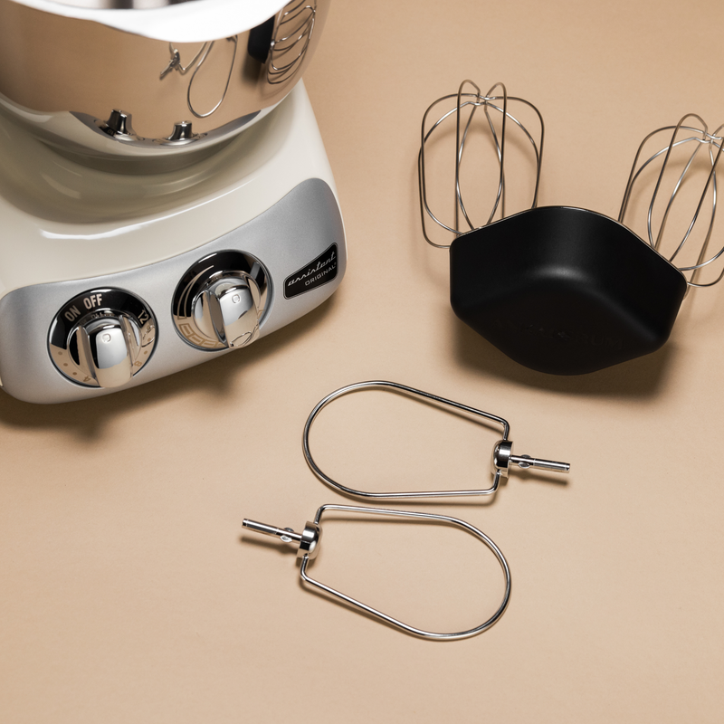 Ankarsrum stand mixer with Premium Beater Set on a table