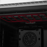 Black oven cavity close-up of rear fan through oven vent opening